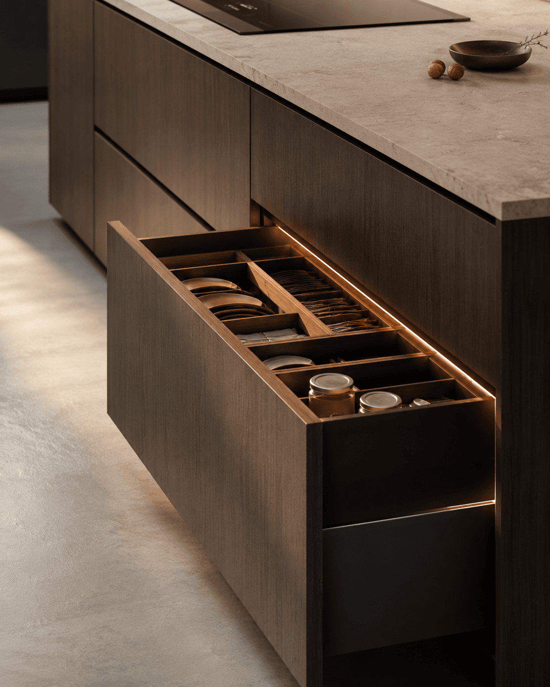Technical composition of kitchen with layered light and integrated tech.
